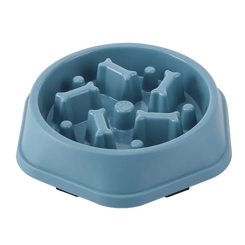 Blue plastic slow feeder dog bowl with puzzle ridges to reduce bloating