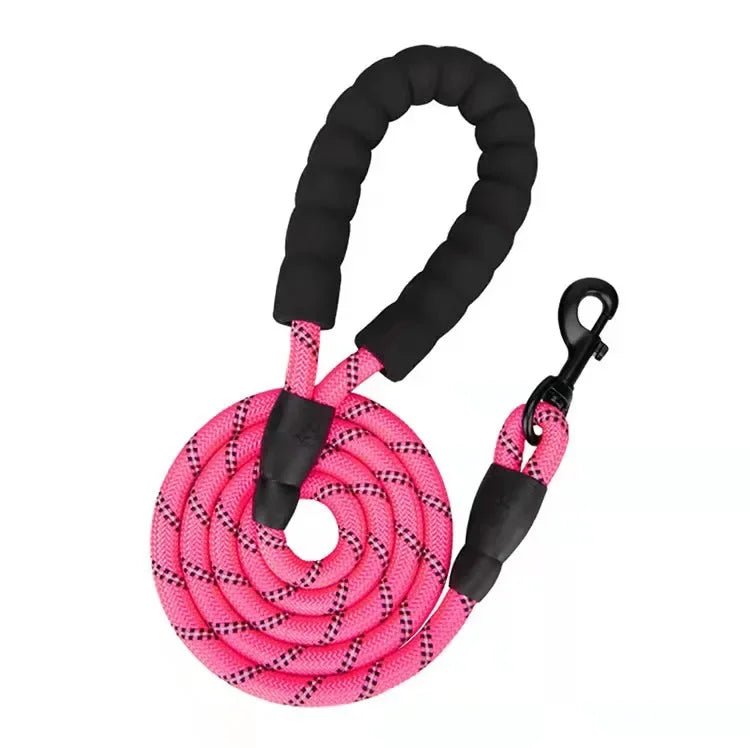 Coiled hot pink reflective shock absorbing dog leash with comfort grip handle