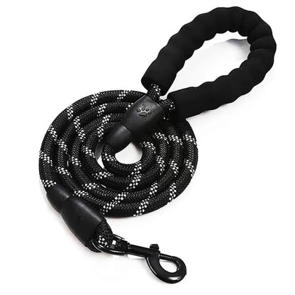 Coiled heavy duty black reflective nylon rope dog leash with a black padded foam handle
