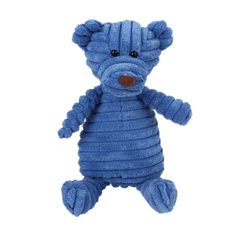 A standalone medium blue corduroy plush bear dog toy with stitched eyes and a brown nose