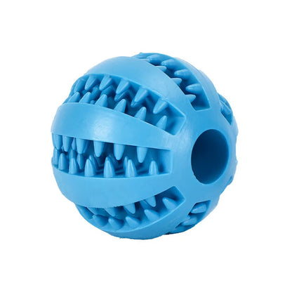 Front view of a standalone medium blue durable rubber dental dog ball with deep reward slots