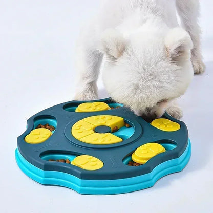 White dog using an interactive dog puzzle slow feeder toy in blue and yellow
