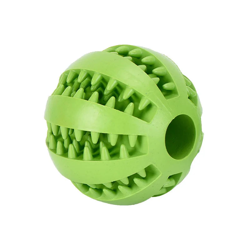 Front view of a standalone vibrant green durable rubber dental dog ball with side treat slots