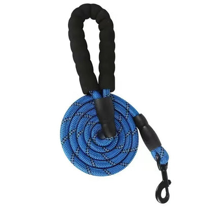 Coiled dark navy blue reflective shock absorbing dog leash with metal swivel snap hook