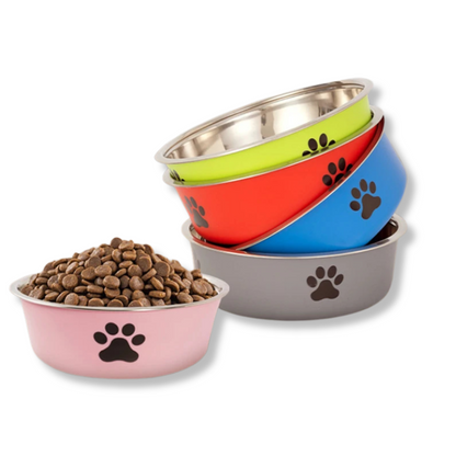 Vibrant multi-colored non-slip stainless steel dog bowls stacked together with one filled with kibble