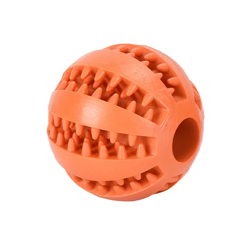 Front view of a standalone textured orange rubber dental dog ball with tooth cleaning grooves
