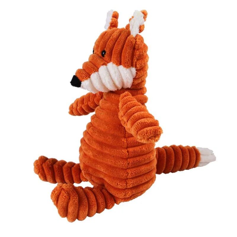 A standalone bright orange corduroy plush fox dog toy with a long white tipped tail