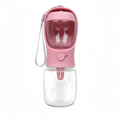 Standalone front view of the pastel pink 2-in-1 dog travel water bottle and snack carrier