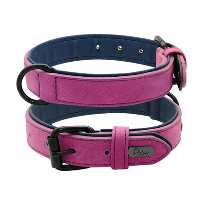Two dark purple padded leather collars showing the soft black inner comfort lining
