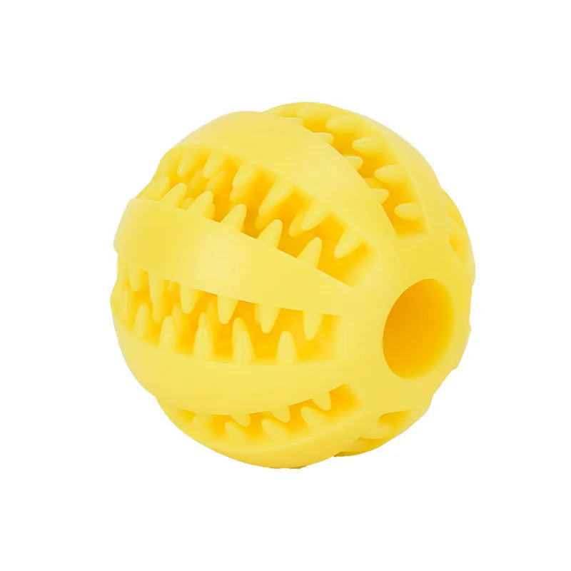 Front view of a standalone bright yellow durable rubber dental dog ball with grooved side slots